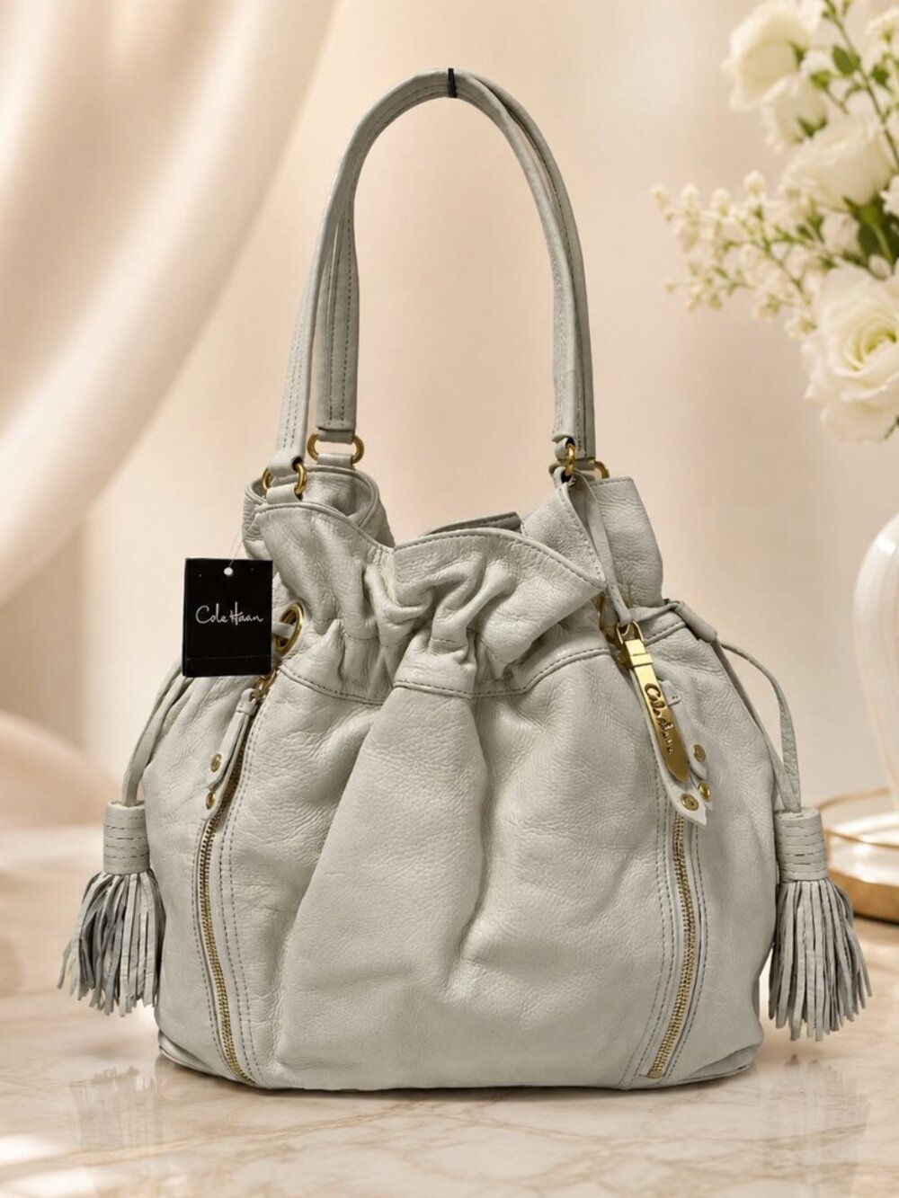 Cole Haan Bailey Ivory Drawstring Tote - Picture 1 of 10